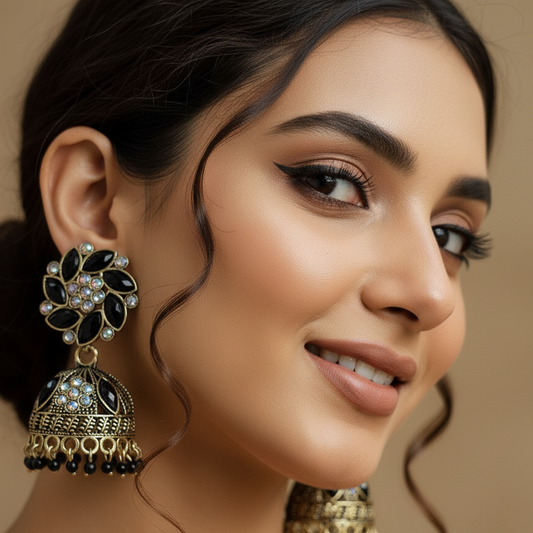 black and gold-toned with crystal stones and beads